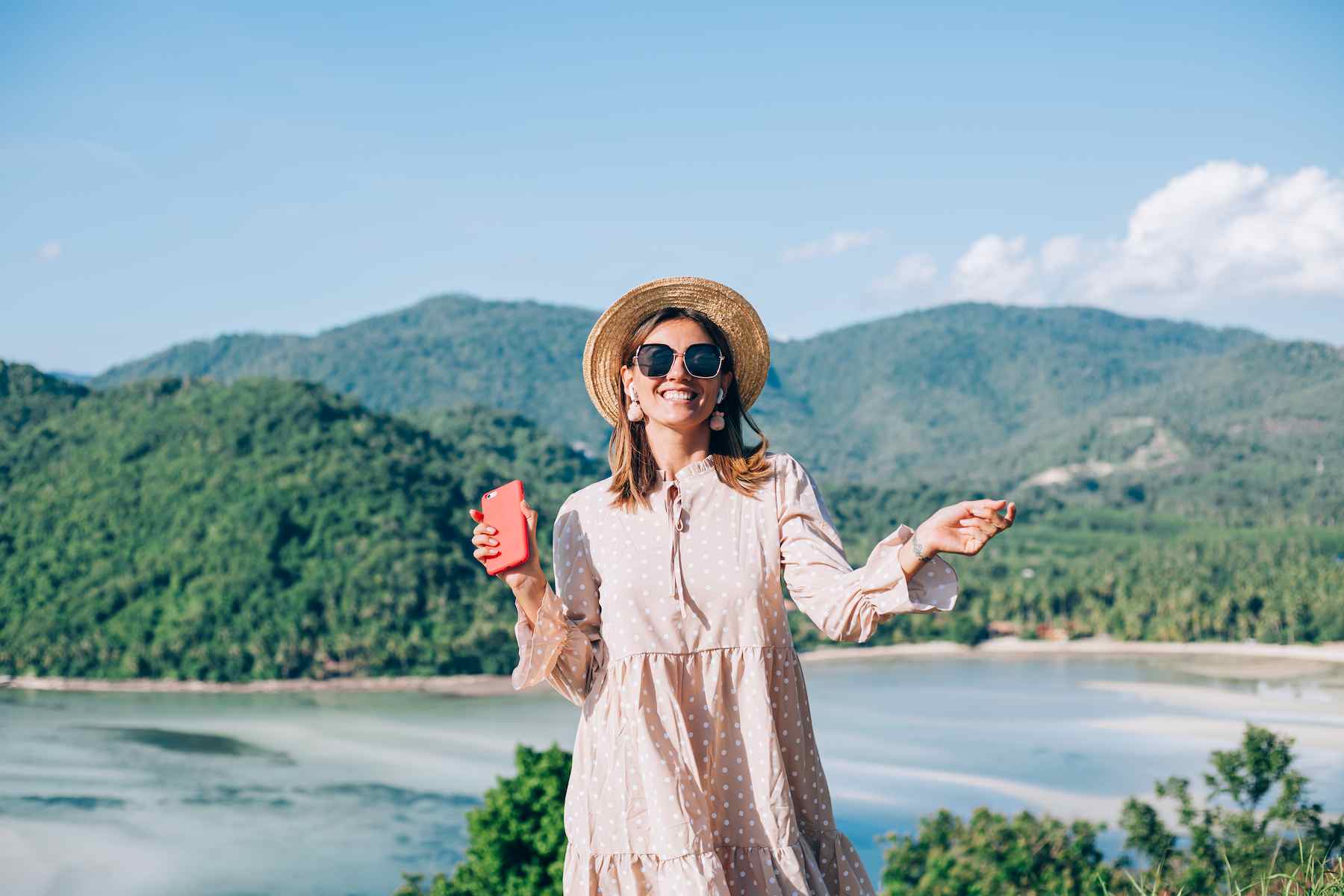 young-woman-summer-cute-dress-straw-hat-sunglasses-dancing-with-smartphone-hand (1).jpg